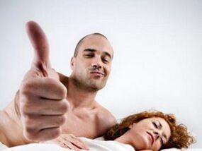 woman with a man who has enlarged his penis using folk remedies